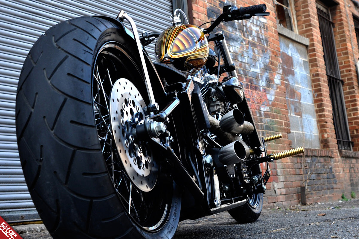 Black motorcycle rear wheel a side