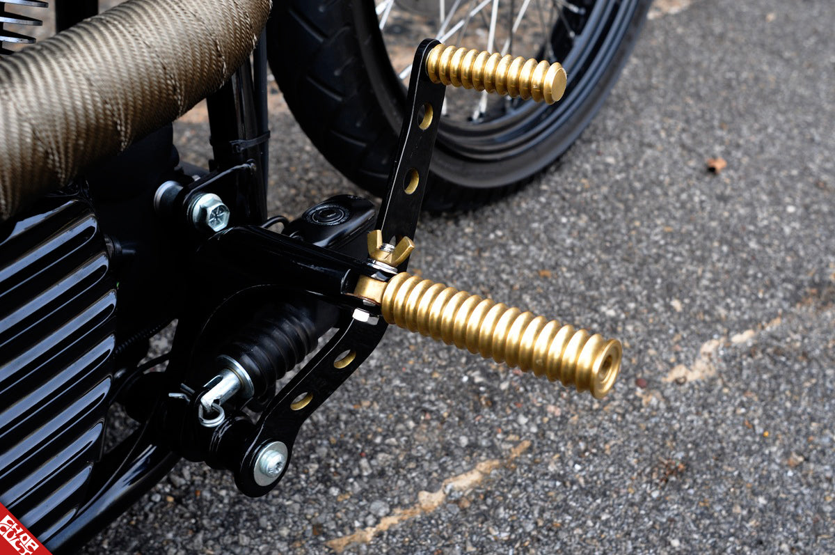 Gold motorcycle foot peg
