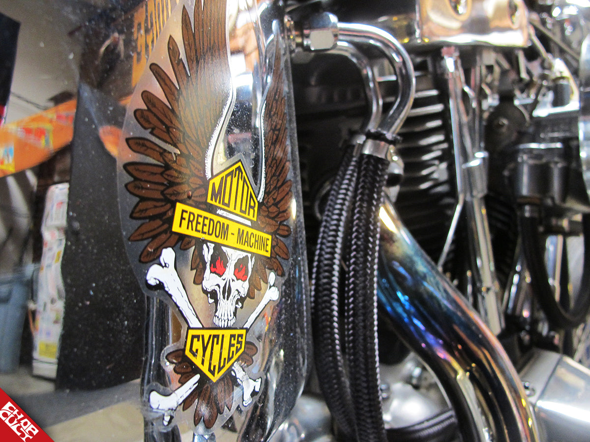 Skull and cross bones "motor freedom" logo decal on the bike