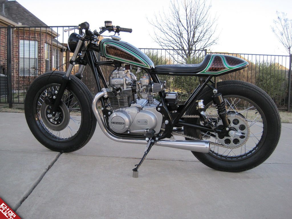 The bike's engine and exhaust pipe