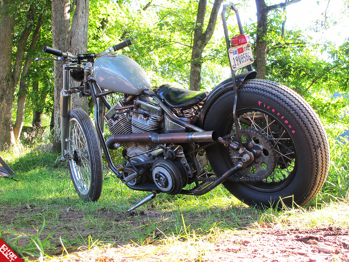 A close up of the bike's back tire and tail light