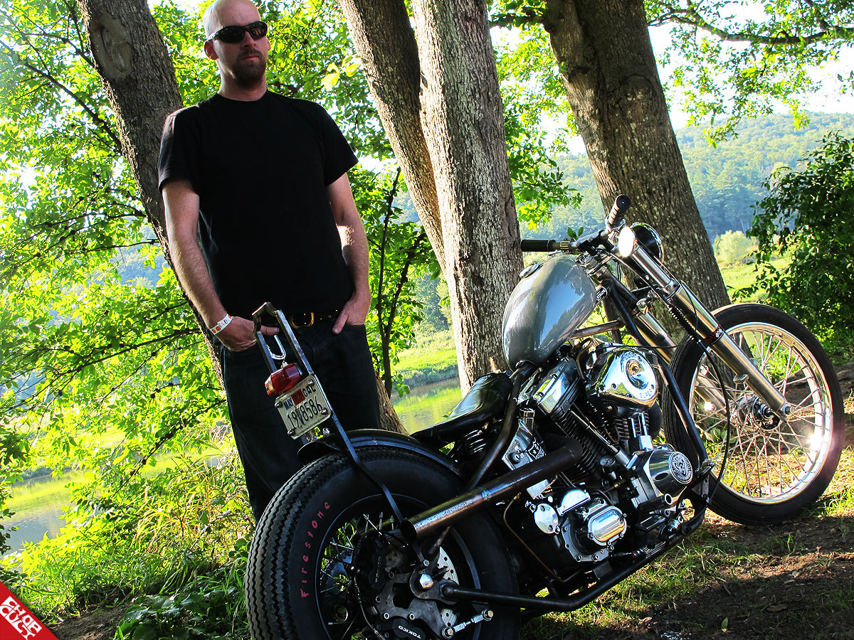 A photo of Malcom with his bike