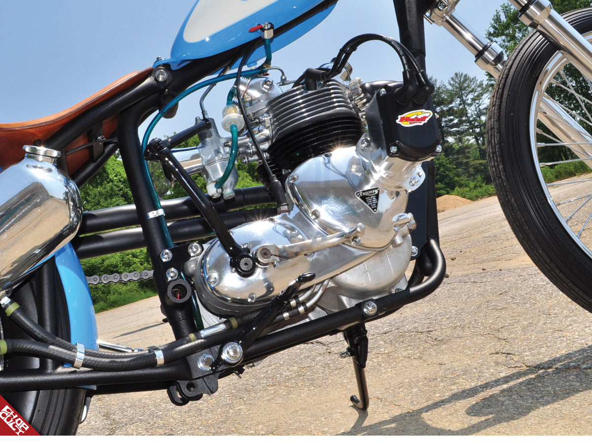 A closeup of the blue bike's motor