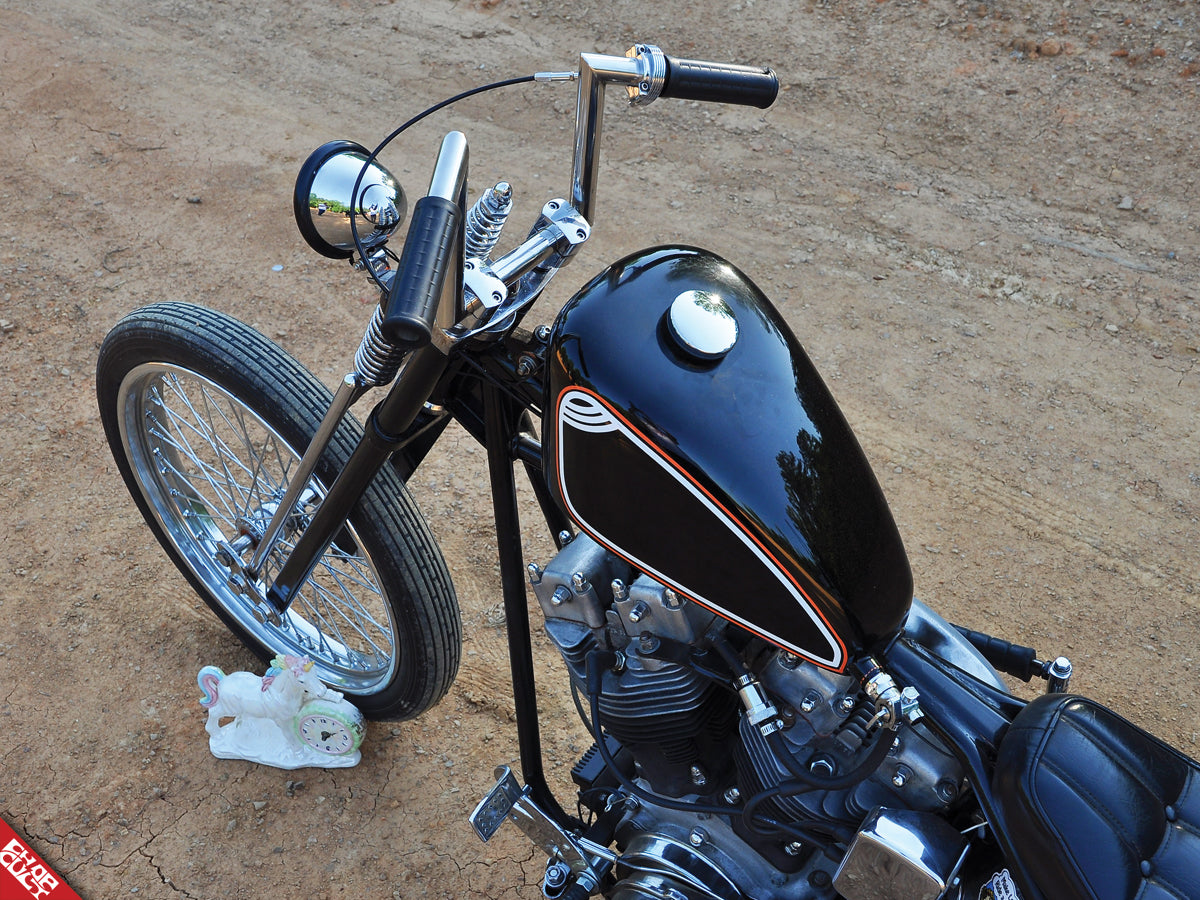 Custom shovelhead motorcycle gas tank and handlebars top angle